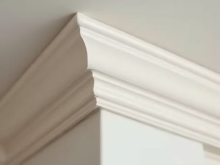 Traditional plaster cornice installation showing factors that influence cornice installation costs