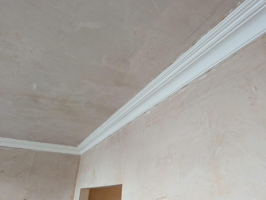 Wide view of completed bay window cornice installation