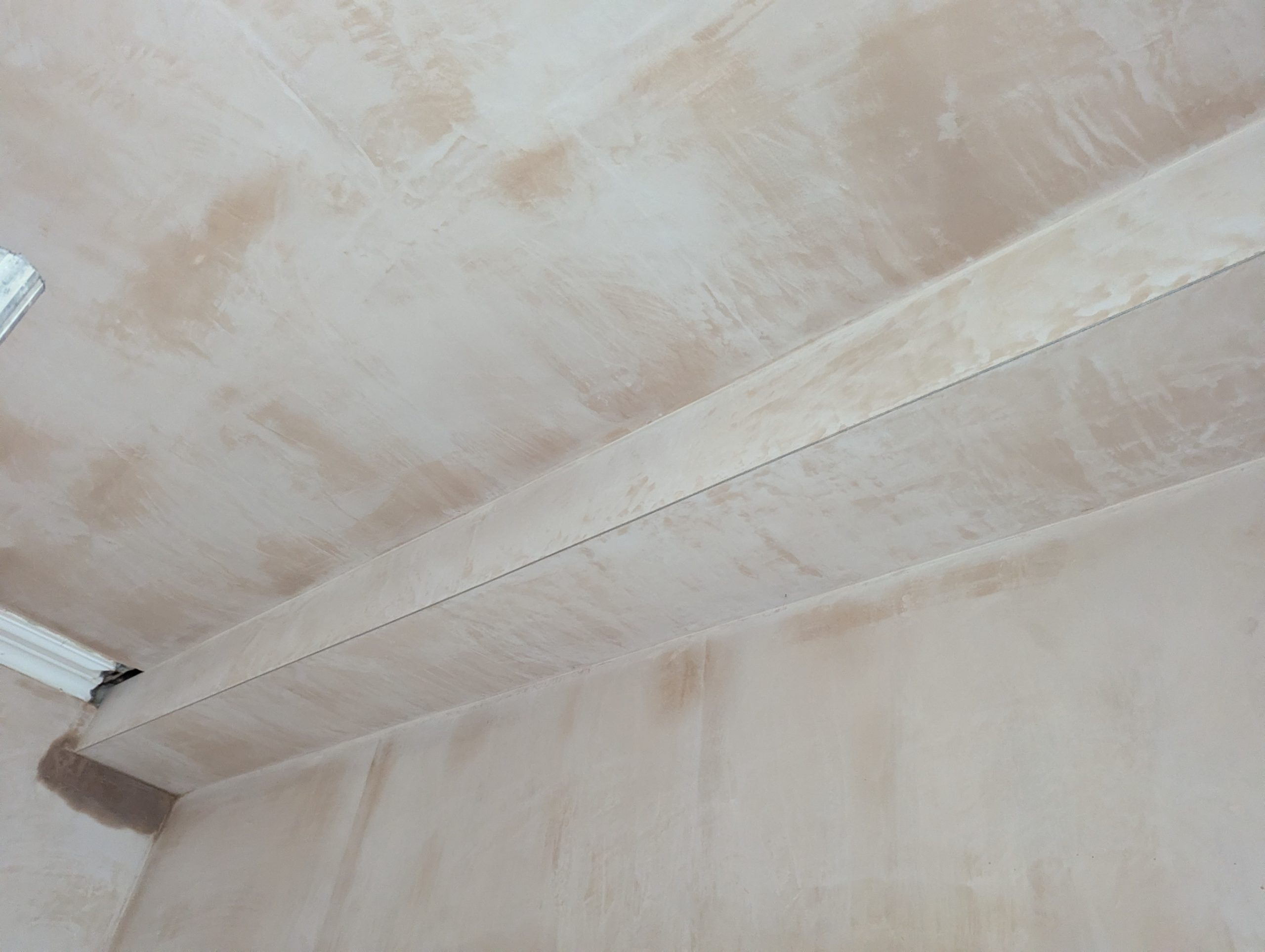 Victorian cornice terminating around structural beam before restoration in Manchester