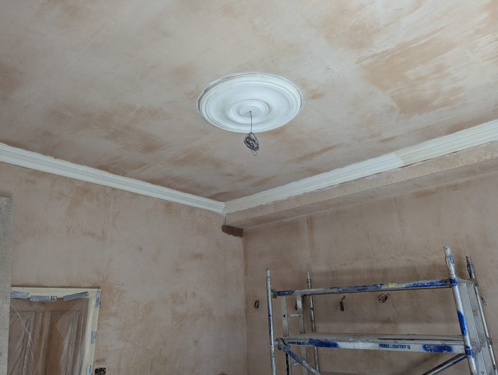 Completed Victorian ceiling restoration with cornice and ceiling rose in Manchester